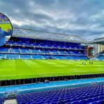 Giant Poses in Rangers Scarf at Ibrox, Glasgow 2026