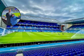 Giant Poses in Rangers Scarf at Ibrox, Glasgow 2026
